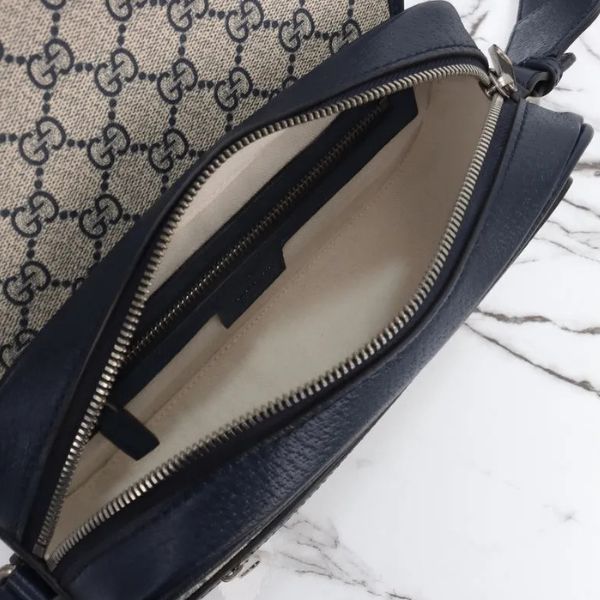 Bolsa transversal de lona Signature 