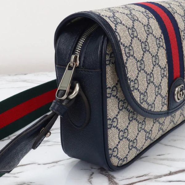 Bolsa transversal de lona Signature 