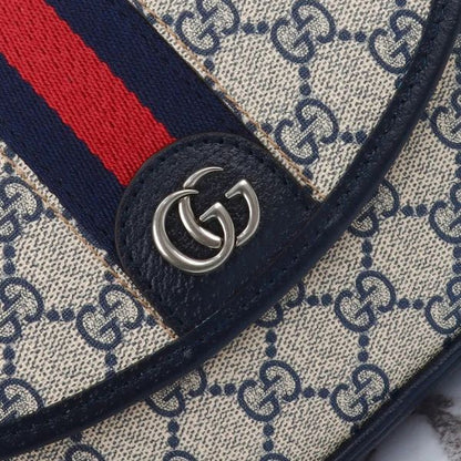 Bolsa transversal de lona Signature 